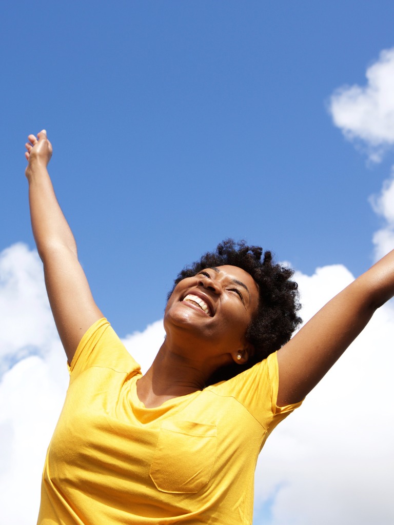 cheerful-young-woman-with-hands-raised-towards-sky.jpg_s=1024x1024&w=is&k=20&c=xLVP3RvmHo7cCuXF_qUYbP_M4uCpemda2FBrrkW-BNU=